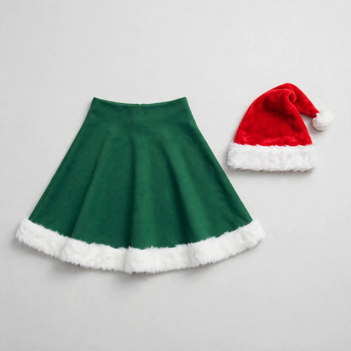 Flat lay of the skirt and Santa hat set