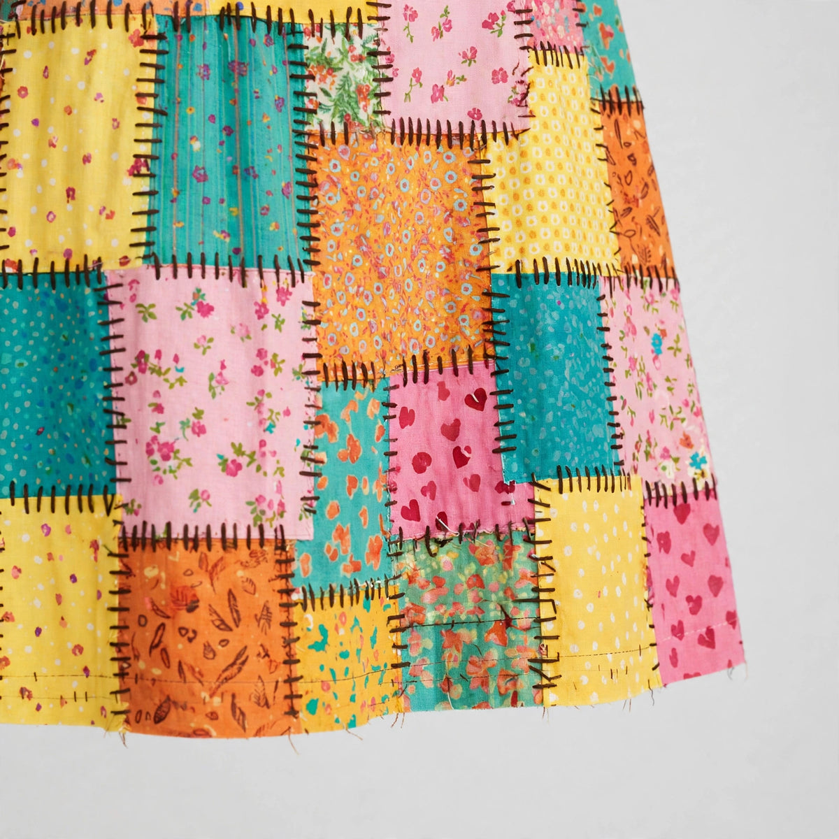Close-up of the fabric patches and hem